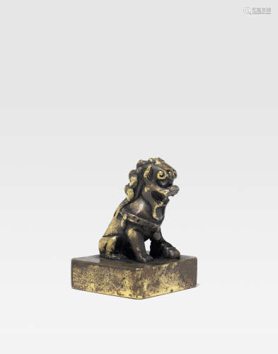 A gilt bronze seal with lion dog finial Ming Dynasty