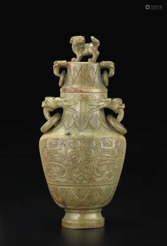 An olive geen jade vase and cover Late Qing/Republic period