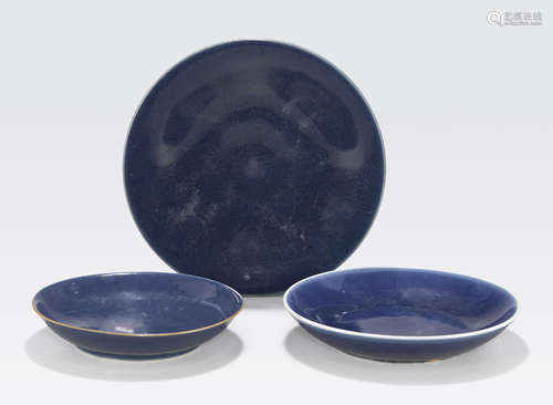 A group of eight cobalt glazed dishes in various sizes 19th century