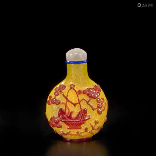 A red overlay yellow glass snuff bottle