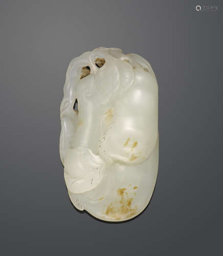 A white jade toggle of peapods Late Qing/Republic period