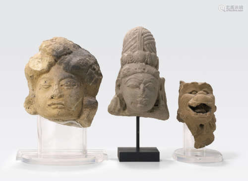 A group of three South and Southeast Asian sculptural fragments