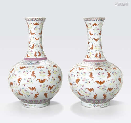 A pair of famille rose enameled Hundred Bats vases Guangxu marks