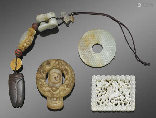 A group of three carved jade plaques Qing dynasty and later