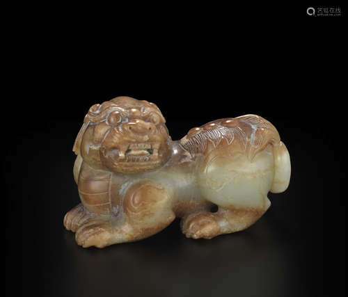 a Mottled jade recumbent Fu-lion