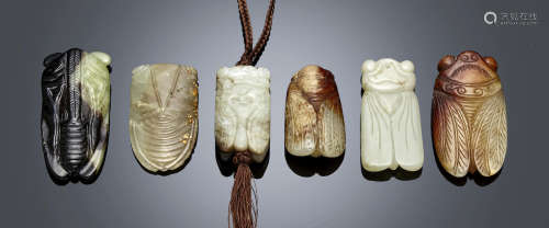A group of six carved jade and hardstone cicadas