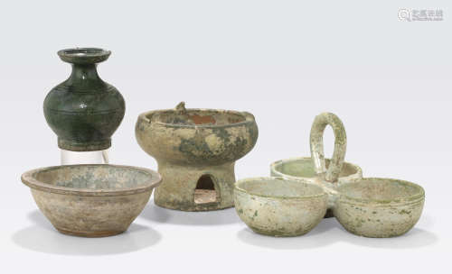 A group of four green glazed pottery vessels Han dynasty