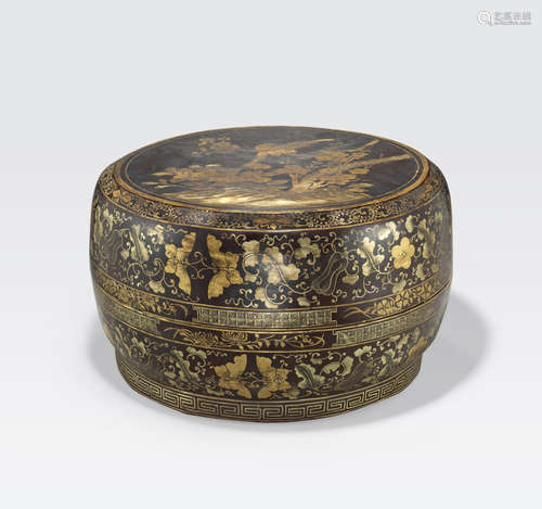 A large black and gilt lacquered circular storage box 20th century