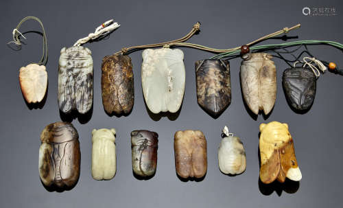 A group of thirteen jade and hardstone cicada amulets
