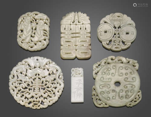 A group of six reticulated jade plaques