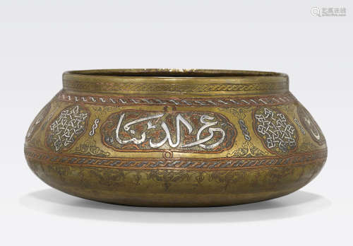 A Mamluk Revival silver and copper inlaid brass basin Egypt or Syria, circa 1880
