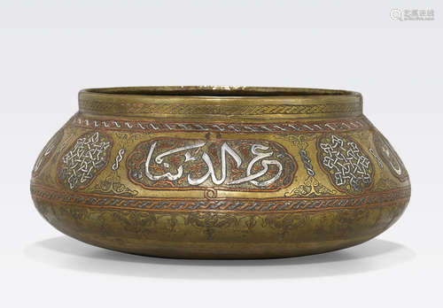 A Mamluk Revival silver and copper inlaid brass basin Egypt or Syria, circa 1880