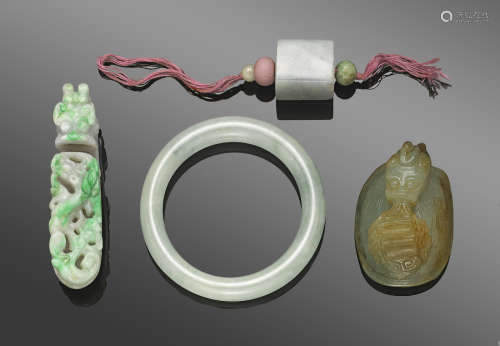 A group of four jade carvings