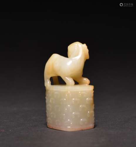 A CARVED WHITE-RUSSET JADE SEAL , Qing Dynasty