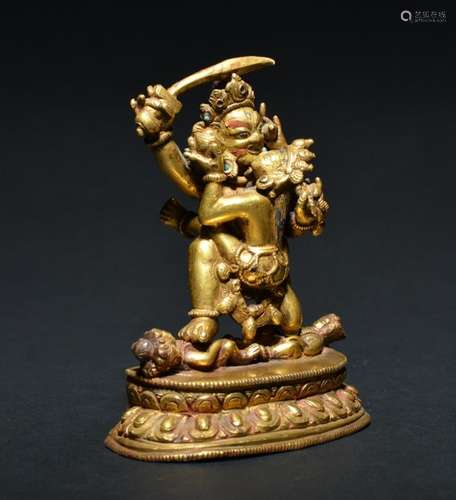 A GILT-BRONZE FIGURE OF ACALANATHA , Qing Dynasty