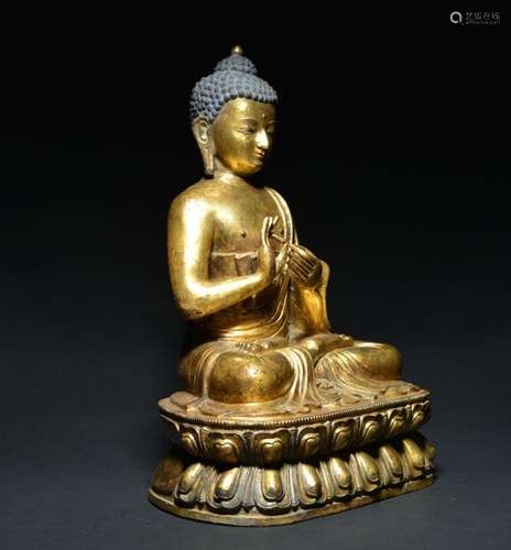 A LARGE GILT-BRONZE FIGURE OF SAKYAMUNI , Period of QianLong