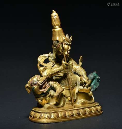 A GILT-BRONZE FIGURE OF VAISHRAVANA , Qing Dynasty