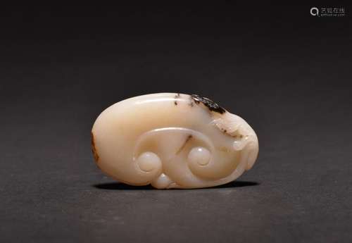 A CARVED WHITE JADE PENDANT , Qing Dynasty