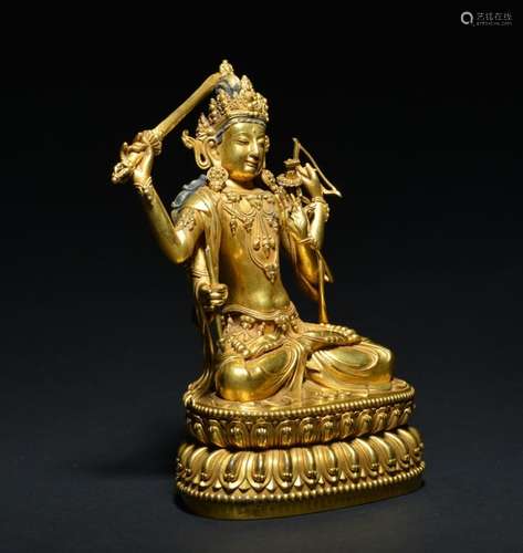 A GILT-BRONZE FIGURE OF MANJUSHRI , Ming Dynasty