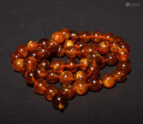 AN AMBER NECKLACE , Qing Dynasty