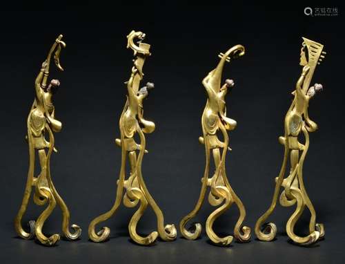 A SET OF FOUR GILT-BRONZE BEAUTYS , Tang Dynasty