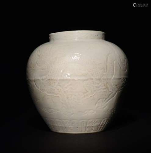 A CARVED WHITE -GLAZED DRAGON JAR , Ming Dynasty
