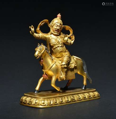 A GILT-BRONZE FIGURE OF VAISHRAVANA , Qing Dynasty