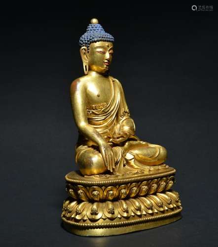 A GILT-BRONZE FIGURE OF BUDDHA , Ming Dynasty