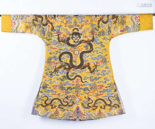 AN IMPERIAL YELLOW BROCADE EMBROIDERED SILK DRAGON ROBE , 18TH CENTURY