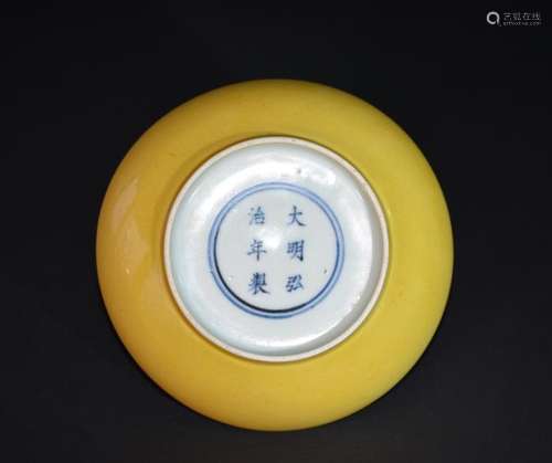 A YELLOW-GLAZED DISH , Ming Dynasty