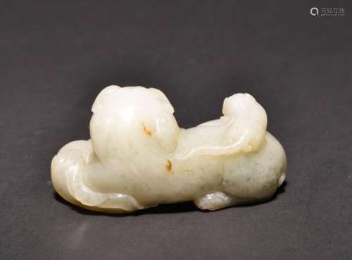 A CARVED WHITE JADE BEAST , Qing Dynasty