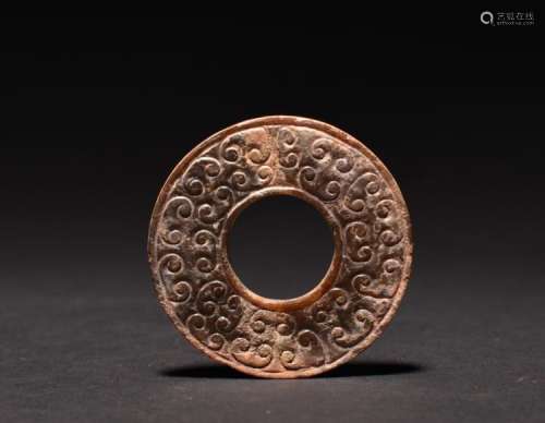 A SMALL ARCHAISTIC JADE DISC  , Spring and Autumn Period
