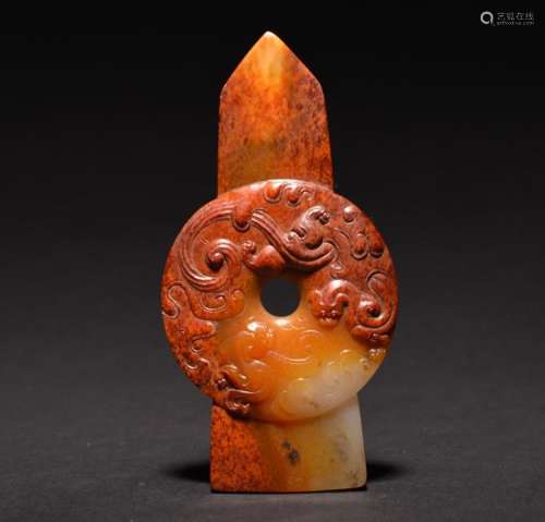 A CARVED WHITE AND RUSSET JADE GUI , Qing Dynasty