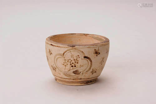 A Chinese Cup With Flower Design