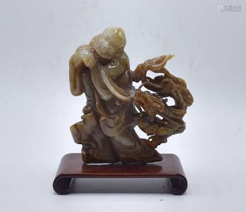 CHINESE CARVED JADE FIGURE OF A BUDDHA