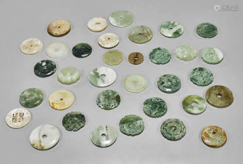 Group of Thirty-Four Chinese Carved Pendants
