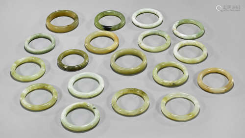 Eighteen Chinese Carved Serpentine Bangles