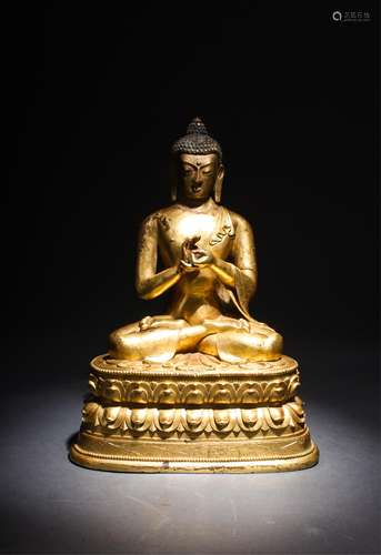 CHINESE GILT BRONZE FIGURE OF SHAKYAMUNI