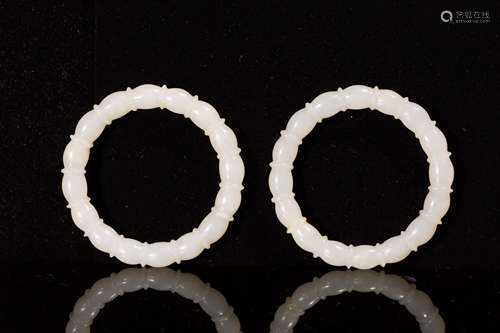 PAIR OF SMALL CHINESE WHITE JADE BANGLES