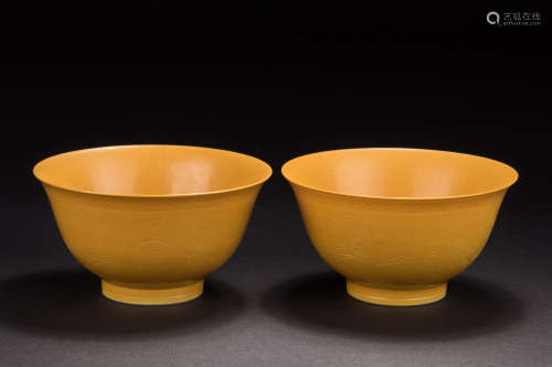 PAIR OF YELLOW GLAZED & IMPRESSED 'DRAGONS' BOWLS
