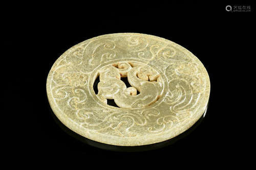 JADE PIERCE CARVED 'MYTHICAL BEAST' DISC, BI