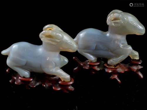 Pair of Chinese Carved Agate Figures of Sheep with Carved Wood Stands