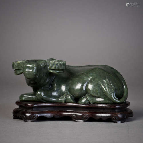 A SPINACH GREEN JADE BULL