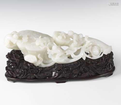A MAGNIFICENT HETIAN WHITE JADE STATUE