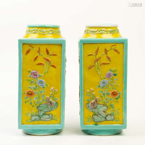 A PAIR OF YELLOW GLAZED WUCAI CARVED PORCELAIN FACETTED VASES, QING DYNASTY