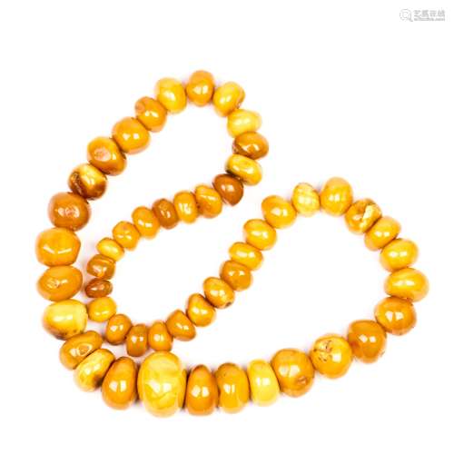 A MISSHAPED AMBER NECKLACE