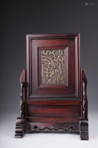 A Chinese jade openwork archaic plaque,