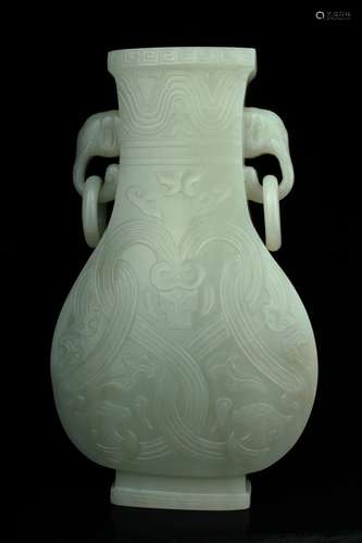 A pale celadon archaistic jade vase, 18th. c.,