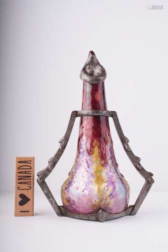 An Art Nouveau enamel and wrought iron vase,