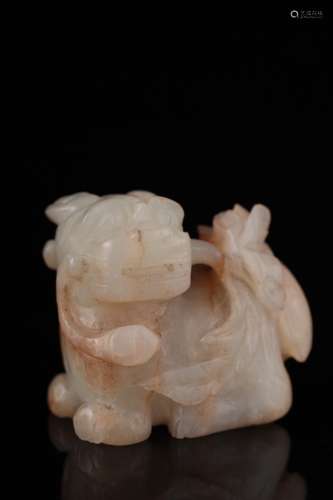 A pale celadon jade mythical beast, 17th century,
